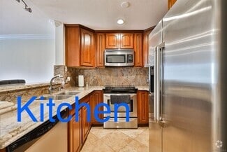 Building Photo - 8889 Caminito Plaza Centro