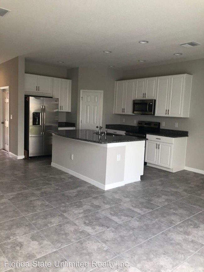 Building Photo - 3 br, 2.5 bath House - 7009 Grand Elm Way