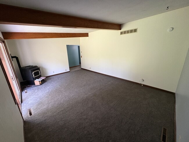 Building Photo - Spacious Home with Attached Garage & Fenced Backyard