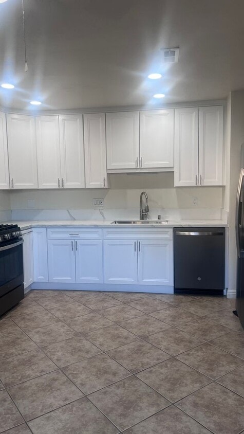 Primary Photo - 3 Bedroom, Two Bathroom Condo