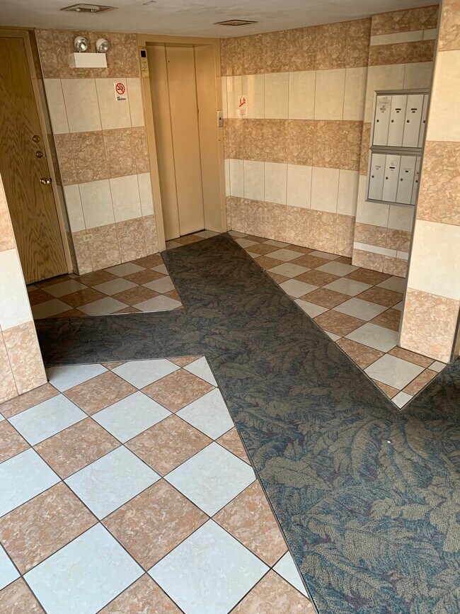 Ceramic Tiled Inner Lobby - 5555 N Rockwell St