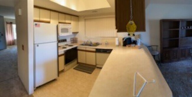 Building Photo - 55+ Community Furnished Condo