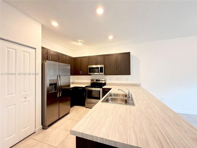 Photo - 28706 Southwest 132nd Court, Homestead, FL 33033 - 3 BR 2.5 BA townhouse