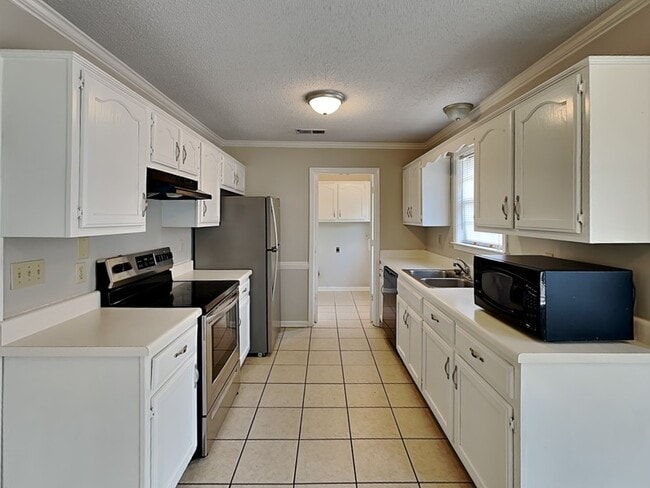 Foto del edificio - 5863 Pipers Green Ln