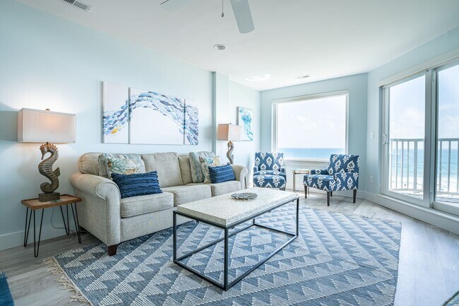 Foto del edificio - SPEND YOUR OFF-SEASON AT THIS TOP FLOOR OCEANFRONT CONDO