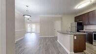 Step into a world of contemporary elegance at 1524 Woodfield Drive. This exquisite single-story home boasts an open floor plan that seamlessly integrates living spaces, creating an ambiance of spaciousness and light. The heart of the home, a gourmet kitchen, showcases sleek stainless steel appliances, rich wood cabinetry, and gleaming granite countertops, inspiring culinary creativity and social gatherings.

The primary bedroom, a generous 200 sq ft retreat, offers a serene sanctuary with ample space for relaxation. Luxurious bathrooms feature modern fixtures and stylish finishes, providing spa-like experiences in the comfort of your own home. Throughout the house, beautiful wood-look flooring adds warmth and sophistication, while large windows invite natural light to dance across the rooms.

This home is designed for easy living with two conveniently placed laundry areas and a thoughtfully designed closet space. The living room, bathed in natural light, provides the perfect setting for both quiet evenings and lively entertainment. Step outside through elegant French doors to embrace indoor-outdoor living, ideal for enjoying North Carolina's pleasant climate.

Located in the desirable Wake Forest area, this home offers not just a place to live, but a lifestyle to aspire to. With its modern amenities, thoughtful design, and prime location, 1524 Woodfield Drive is more than a house – it's the key to unlocking your dream life. Don't miss this opportunity to elevate your living experience in a home that truly has it all.