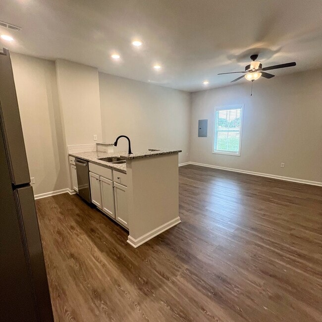 Bright kitchen with brand-new stainless appliances - 205 Cherry Way