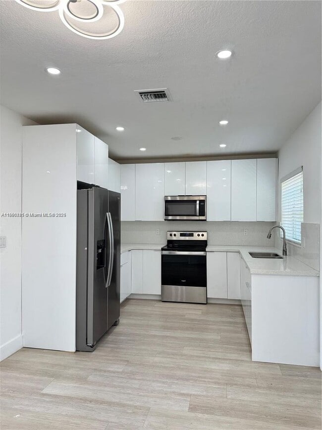Photo - 693 NE 80th St House