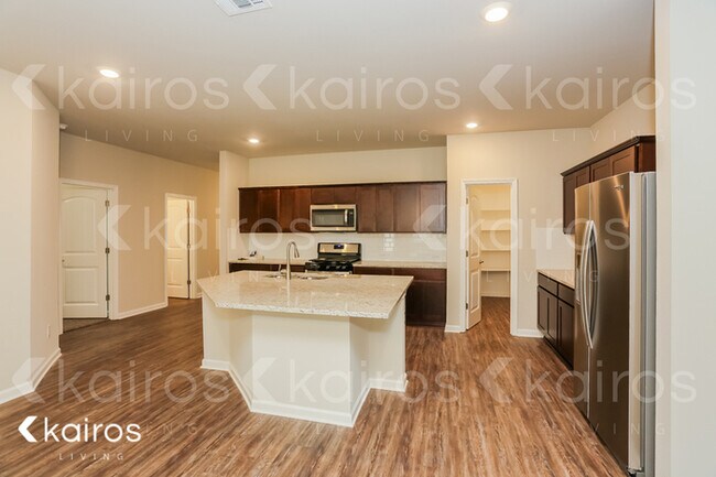 Foto del edificio - 6637 Tiger Pointe Dr.