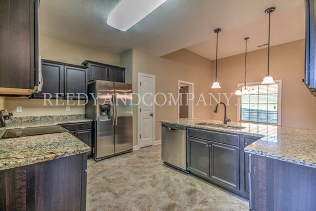 Building Photo - 4684 Ravencrest Cv N