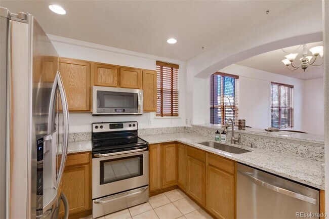 Updated kitchen with granite countertops - 1747 N Pearl St