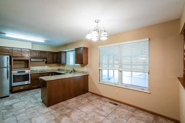 Building Photo - 4131 Les Cherbourg Ln