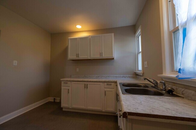 Building Photo - Stylish, Updated & Ready to Call Home