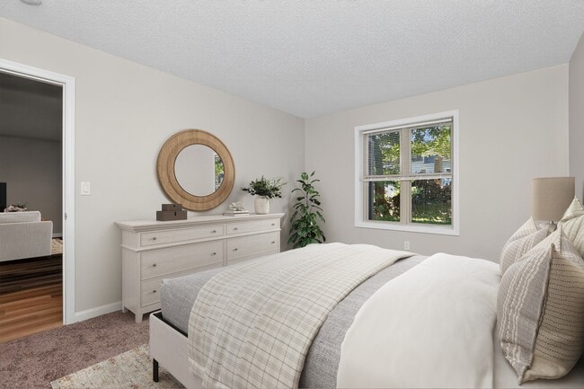 Transform your living space at Eagle Rock Apartments at Mohegan Lake. This beautifully designed bedroom features natural light, modern decor, and a welcoming atmosphere. Elevate your lifestyle and schedule a tour today! - Eagle Rock Apartments at Mohegan Lake