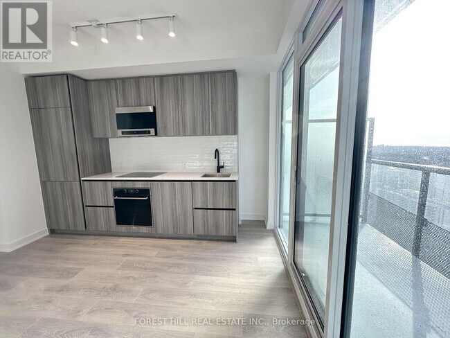 Photo du bâtiment - 117 Broadway Ave
