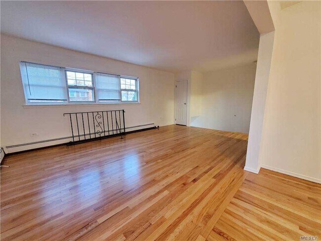 Building Photo - 211-14-211-41 41st Ave