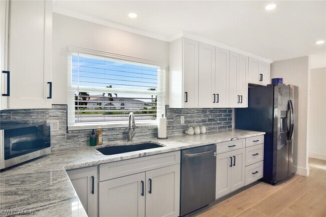 Building Photo - 5037 Pelican Blvd