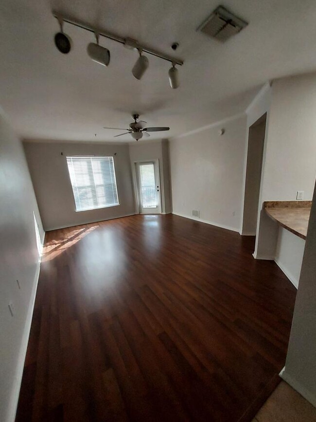 Spacious Living room with balcony and storage room - 10019 Courtney Palms Blvd