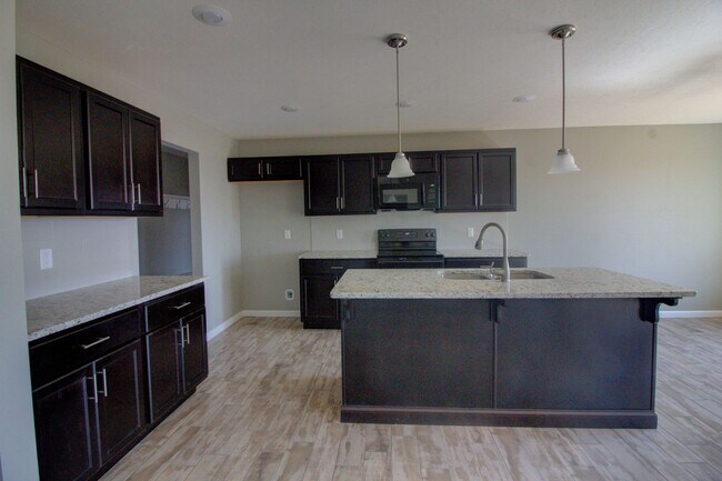 Building Photo - 3 Car Garage in Nixa!