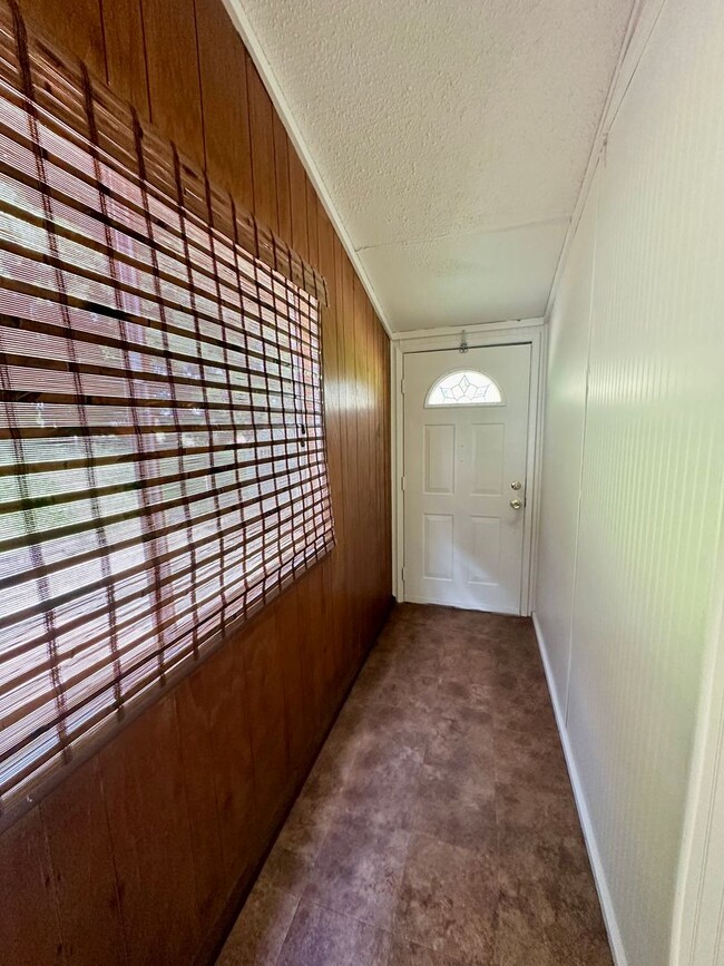 Building Photo - Country 2 Bedroom Available 10/06/2024