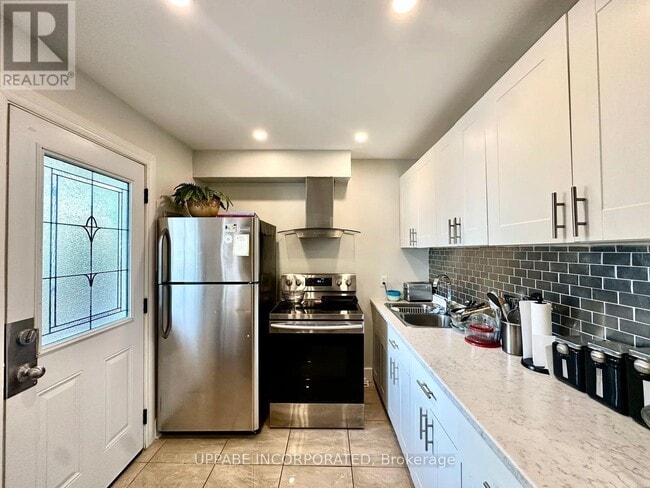 Building Photo - 240 Marier Ave