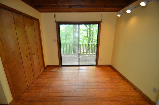Building Photo - Private Wooded Retreat Near UNC with Vaulted Ceilings & Cozy Woodstove