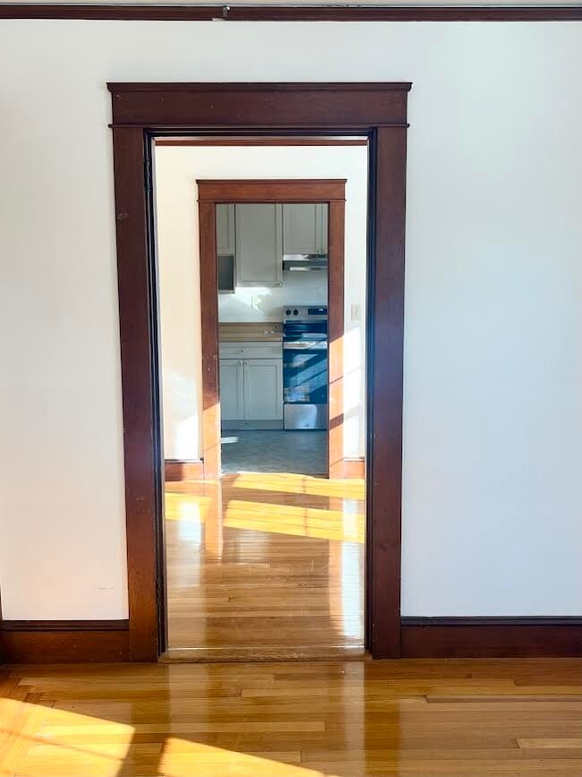 Looking from the living room through the dining room and into the kitchen - 52 Old Fort Rd