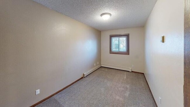Building Photo - 202 4th Ave SW