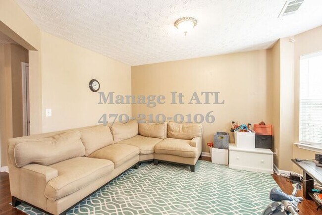 Foto del edificio - Charming 4-Bedroom Home for Rent in Prime ...