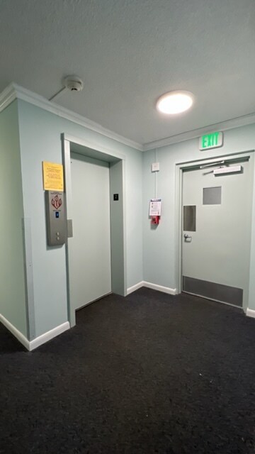 Elevator and stairwell entry - 2425 NE 135th St