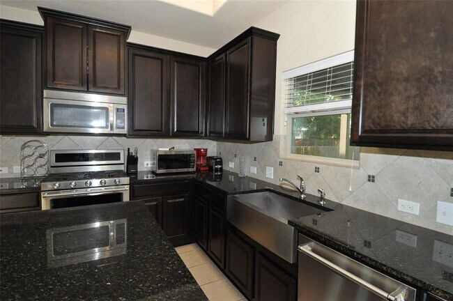 Building Photo - 7709 Menchaca Rd