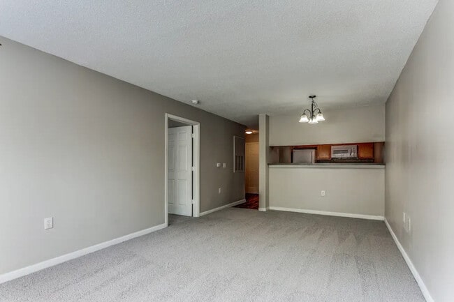 1 BR, 1 BA - 840SF Living Room - Grand Summit Apartments