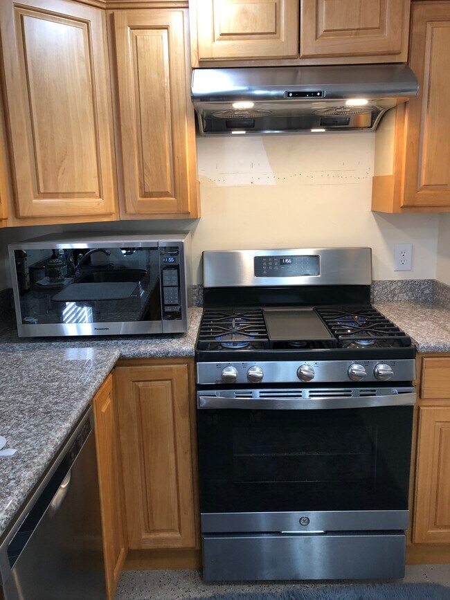 new, stainless steel appliances - 223 W G St