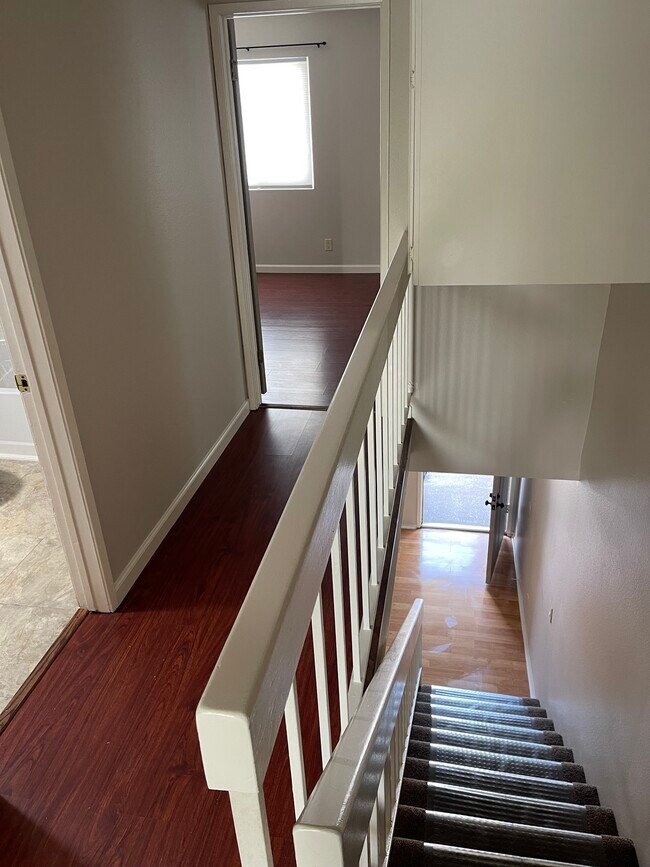storage area over and under stairwell - 201 S Ventura Rd