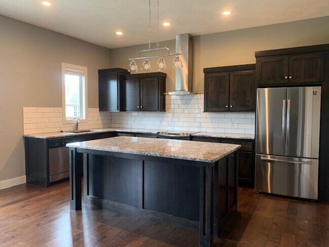 Building Photo - Beautiful Open Layout 3 Bedroom 2 Bath 3 Car Garage NIXA