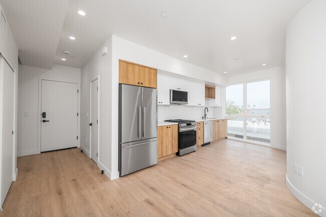 3 habitaciones, 3 baños - 1175 pies cuadrados - Cocina - 3844 W 27th St