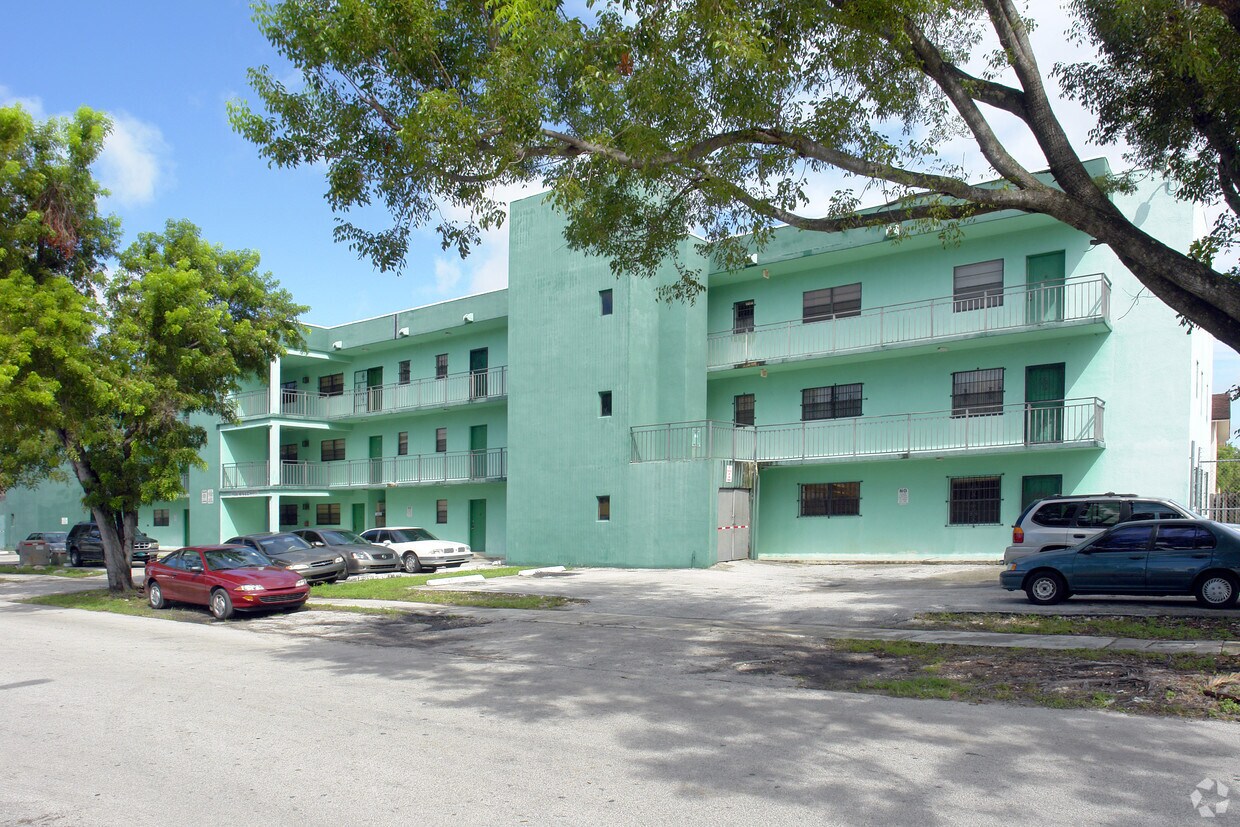 Building Photo - Paradise Properties