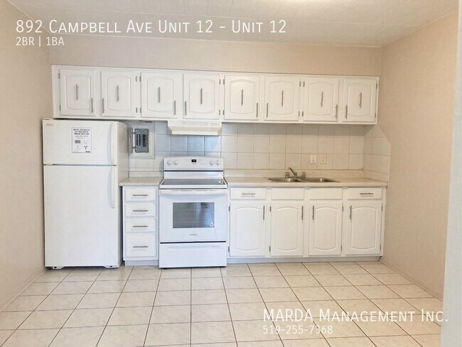 Photo du bâtiment - SPACIOUS 2 BED/1 BATH APT ON CAMPBELL + HYDRO