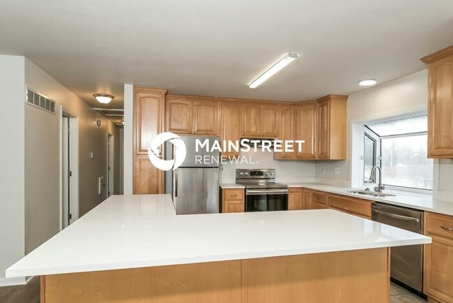 Building Photo - 4 Bedroom Pet-Friendly Home in BALLWIN, MO with Main Street Renewal