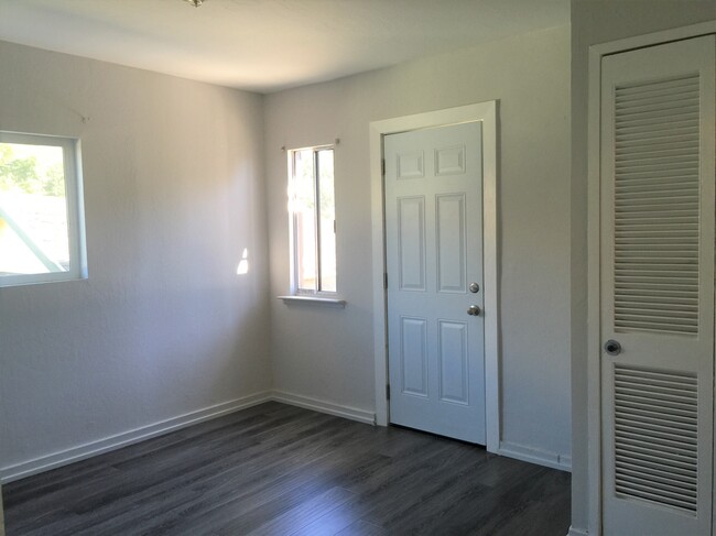 Bedroom with back door - 128 N 10th St