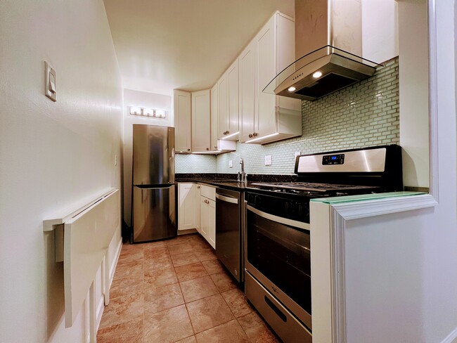 Open kitchen is perfect for entertaining guests! - 4515 Willard Ave