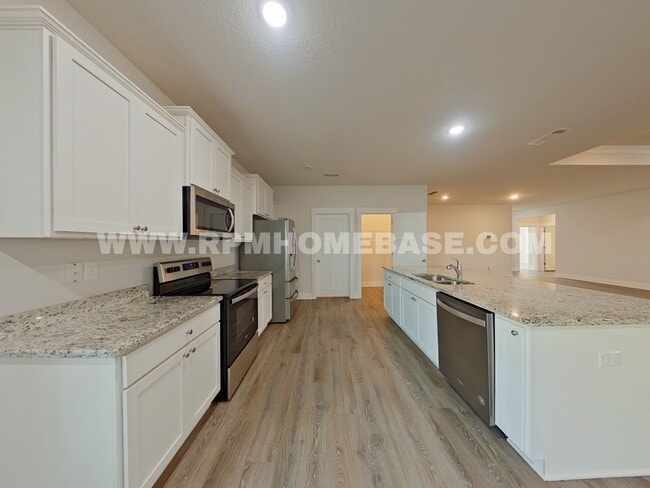 Building Photo - Spacious 4-Bedroom Home with Community Pool and Modern Features in Shoal River Landing