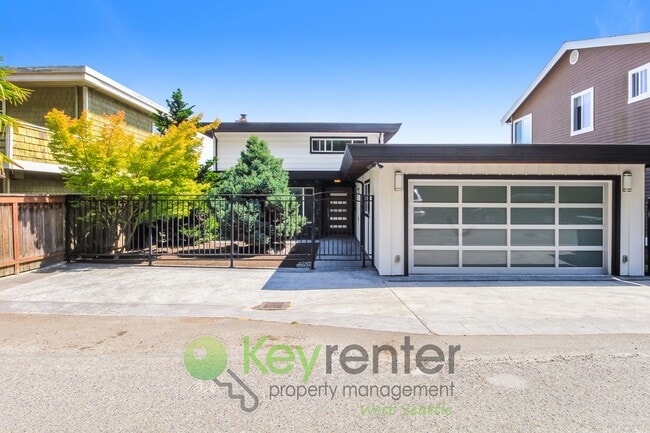 Building Photo - Waterfront Elegance with Private Dock and Designer Finishes