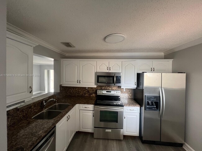 Building Photo - 15711 SW 137th Ave