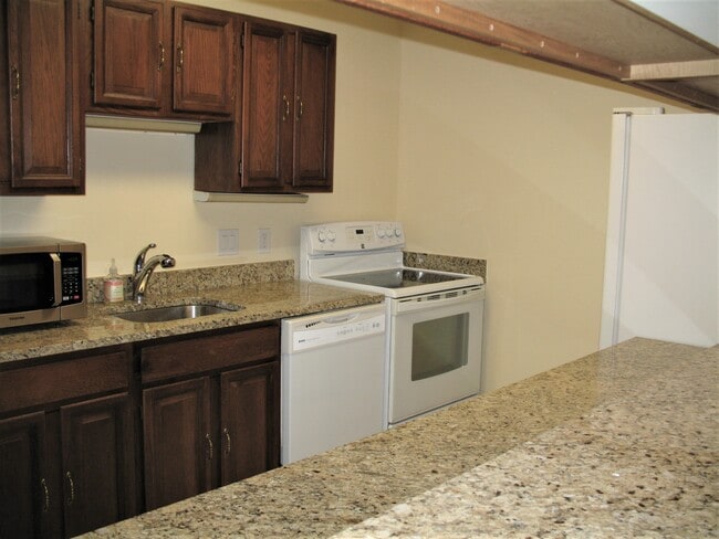 Large Galley Kitchen with Granite Countertops - 2555 Pennsylvania Ave NW