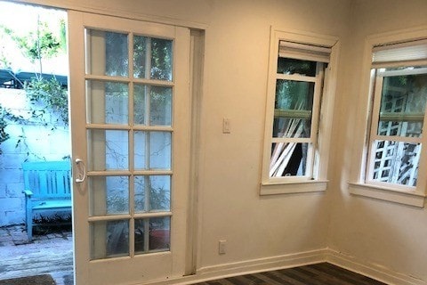 Bedroom with doors to private yard - 7415 Rosewood Ave