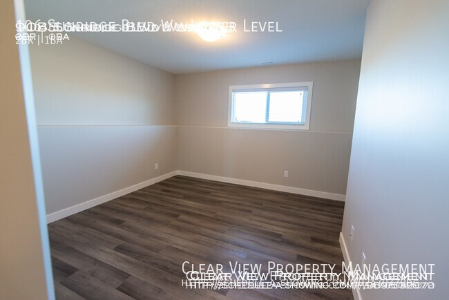 Building Photo - Amazing 2 bedroom / 1 bathroom with zero scaped yard in West Lethbridge!