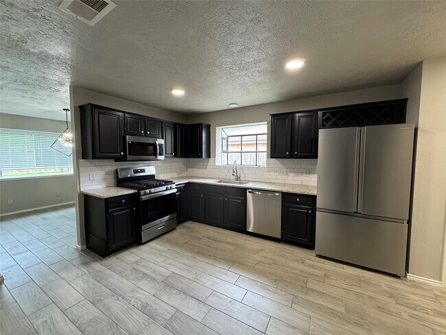 Foto del edificio - 13318 Raven Roost Dr