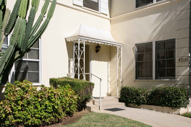 Inviting front porch; security gate - 4113 Perlita Ave