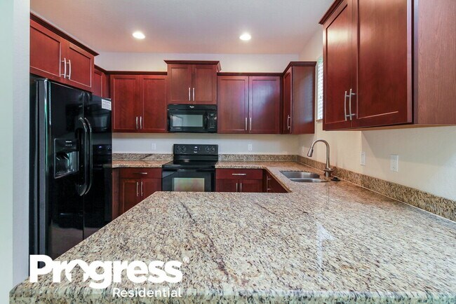 Building Photo - 5607 Caranday Palm Dr